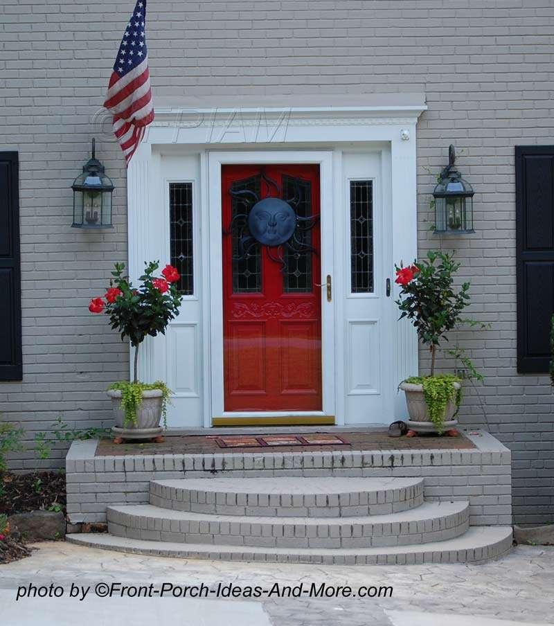 A red or blue front door can be very striking and attention-getting, especially against white trim.