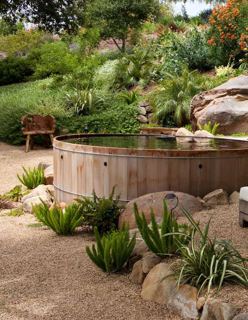 An oversized cedar hot tub was added as a place to soak on summer days,