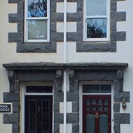 with the use of gables and bay windows to articulate the street frontage.