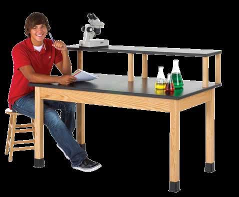 The table features solid oak or maple (your choice) aprons and riser supports finished with a chemical resistant finish.