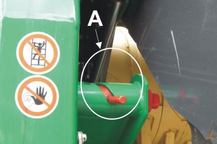 Press the red locking lever (A) to the right and then downward (see images).
