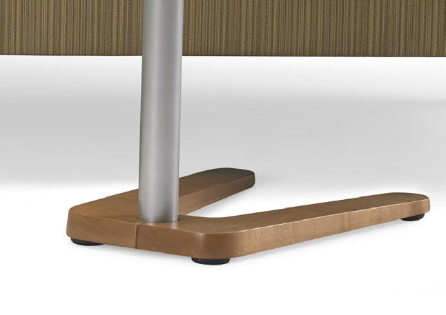 The base is designed to fit under the sofa; bringing the surface of the table closer to the guests and minimizing its