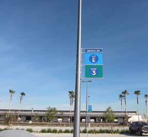 Public parking signs and parking lot/structure identity signs should be integrated with the directional system.