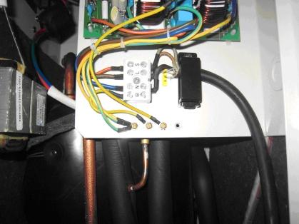 service panel and front service panel of the outdoor unit, and then remove both the