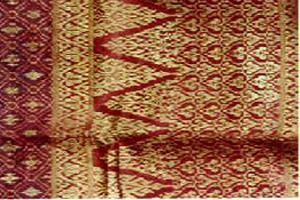 Songket sarong with motifs of bunga mahkota raja designed at the kepala kain section