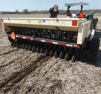 Similarly, lawn fertilizer spreaders (middle) are another commonly available tool for broadcasting seed.