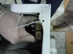 Remove the tub seal clamp by using the pliers,