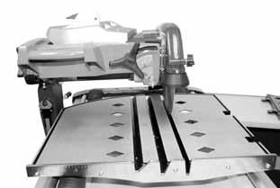 Move the Table (F) toward the front of the Saw so that the Blade does not interfere with the Table when setting up the Cutting Head. 3.