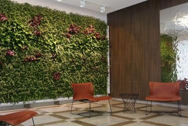 ivy walls) in that the plants root into a structural support, which is fastened to the