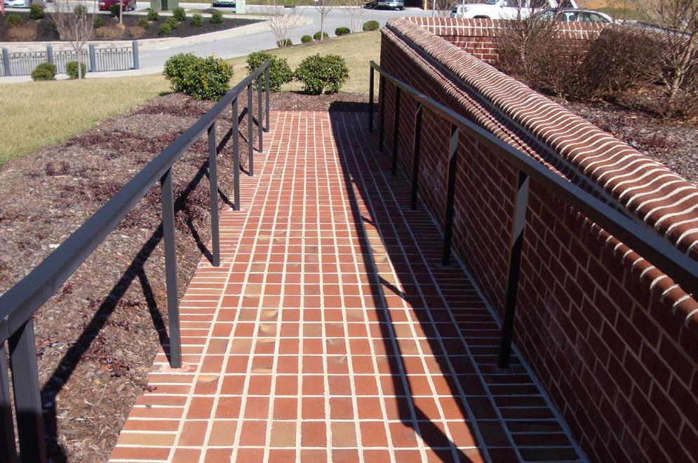 Mortar Joints, max. 1/2 in. (13 mm) Sand Joints, max. 3/16 in. (4.8 mm) a) Square-Edged Pavers Photo courtesy General Shale, Inc. Photo 10 Stack Bond Pattern on Accessible Ramp less than ¼ in.