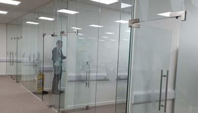 Polar glazed partitions used to create executive offices 8