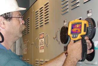 Arc-Ratings Example of a thermographer using an IR viewing window and wearing standard level of PPE required while operating energized electrical equipment in an enclosed and guarded condition.