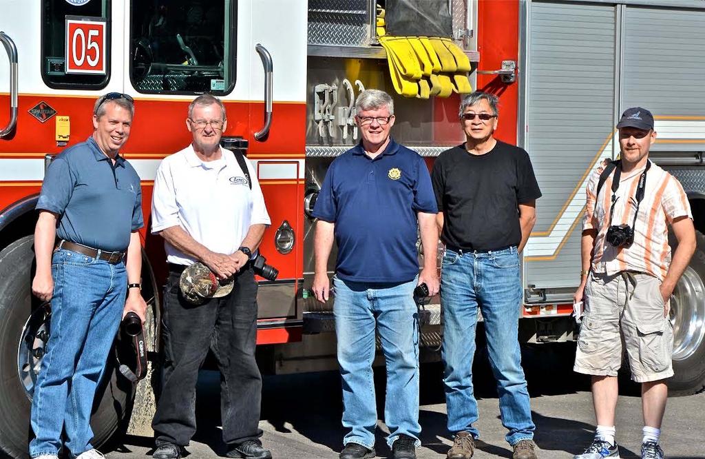 Earlier in the summer, several members joined John Bowerman (left) and Mark McDonald (centre) in their home province to tour Calgary area stations. Pictured here with Calgary P.