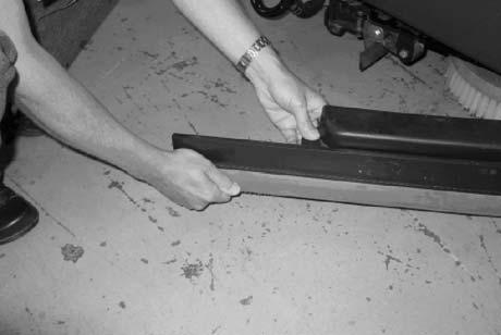 MAINTENANCE REPLACING SIDE SQUEEGEE BLADES 1. Open the side squeegee. 2. Pull the old side squeegee blade from the side squeegee retainer. Slide the new blade onto the retainer.