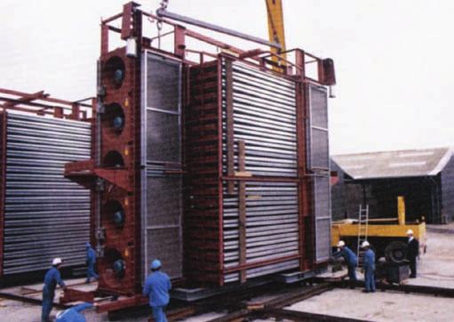 One frequently used method is to build the dryer in modules and then move each module into place by means of a crane, or by sliding the modules on rails.