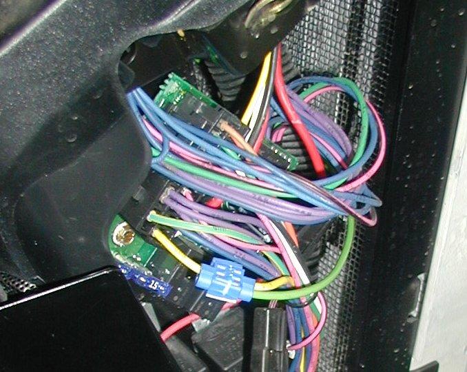 12) Route the 66 light green wire from the relay to the electrical panel on the right side of the console.