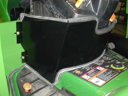 John Deere X Series CAB MOUNTING INSTRUCTIONS Figure 11 Figure 12 Installing Seal Panels 16) Install the lower left side air intake panel, #4-14672.