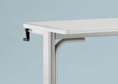Adjustable-height table can be raised or lowered between 28" and 40" high.