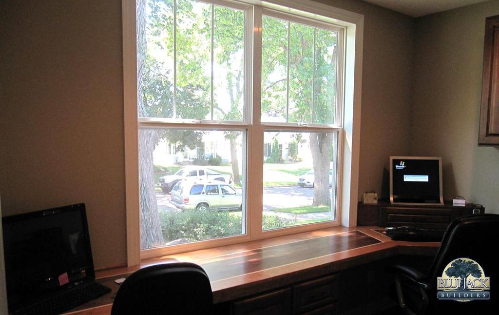 AFTER PHOTO: #1 A large south facing window lets in plenty of sunlight and instant visibility