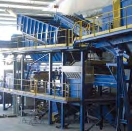 The first treatment of mixed waste consists in the opening and emptying of the bags, which is carried out by a special machine provided with a hydraulically driven mobile floor.