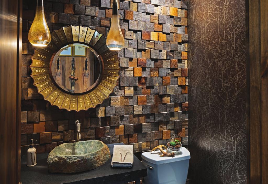 ABOVE Decorative Texture Though it looks as if individual pieces of wood adorn the bathroom walls, this wall covering actually comes in large tile format, making it easier to create than it looks.