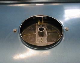 10) is located in the right rear corner under the hob, to gain