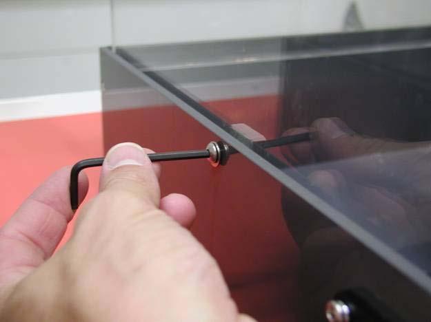 Vitrine Removal and Replacement Use the 1/8 allen wrench to remove 2 each #10-24 stainless steel button head screws from the drain pan.