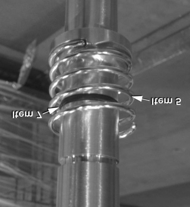 6. Install one of the O-rings (item 7) in the groove on the agitator shaft closer to the prop, then cover the exposed surface