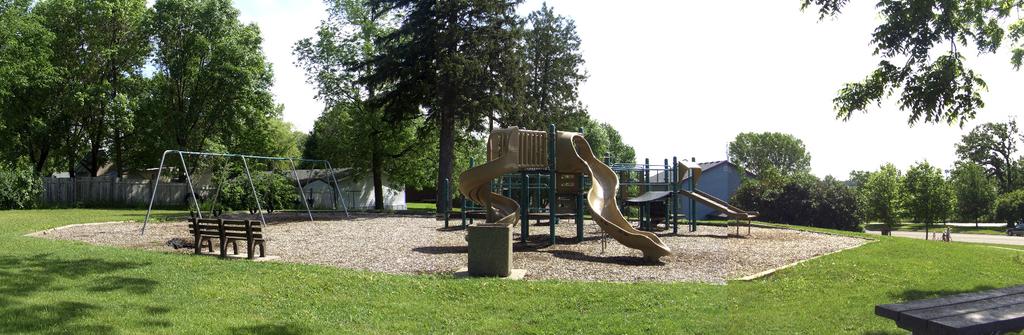 Located on a hill, providing accessible routes to the playground equipment and park amenities will continue to be a challenge. The park amenities also lack a consistent character.