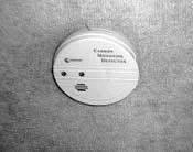 CARBON MONOXIDE ALARM Your coach is equipped with a carbon monoxide (CO) alarm, located on the underside of the overhead cabinet above the left rear dinette seat.