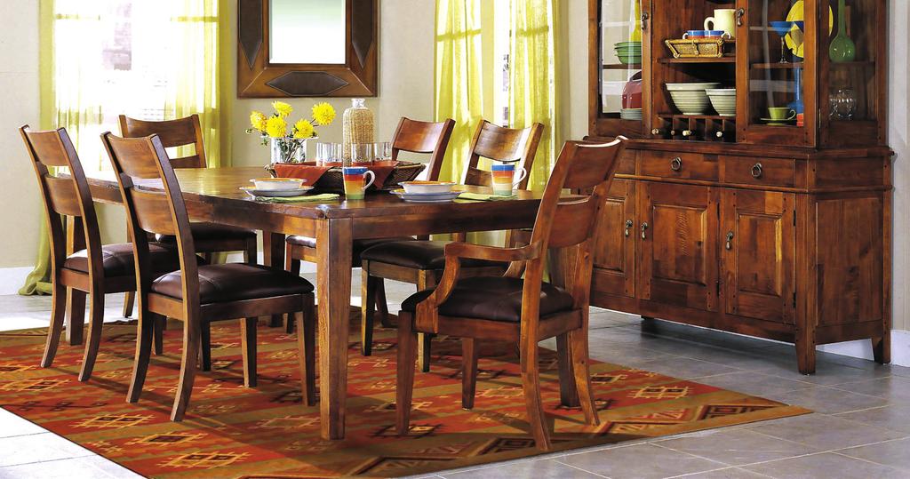 Honey toned finish Set includes table and 4 upholstered side chairs Solid wood and