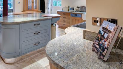 STOKESLEY Traditional oak framed kitchen with a painted island and breakfast bar The gentle curves and traditional craftsmanship combined with excellent design make for a practical and beautiful