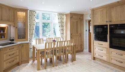 RICHMOND Arts & Crafts style oak kitchen with Corian work-surfaces and Miele appliances Designed and made in an Arts & Crafts style, this oak framed and panelled kitchen has been designed to provide