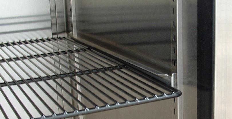 Fit the stainless steel tray slides into the corresponding slots in both the front and back support rails. Each shelf requires two tray slides. 5.