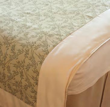 REVERSIBLE TREATMENT TABLE COMFORTER A rich inviting texture designed to perfectly match our massage table skirts, with a slightly heavier weight to keep client nice and warm.