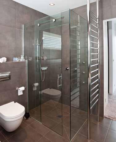 INSPIRED VISION FOR BATHROOMS sliding door systems A sliding shower door is the