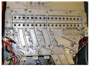 Manifold Plate Removal 1. Remove 6 screws on perimeter of manifold. Gas Orifices. Remove screws at gas valve assembly.