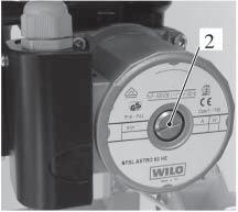 Open each radiator air vent starting at the lower point and close it only when clear water, free of bubbles, fl ows out. Purge the air from the pump by unscrewing the pump plug 2 (Fig. 15.