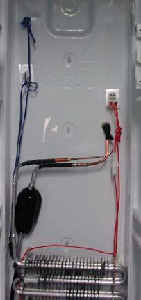Removing and replacing Freezer parts D-Sensor Housing