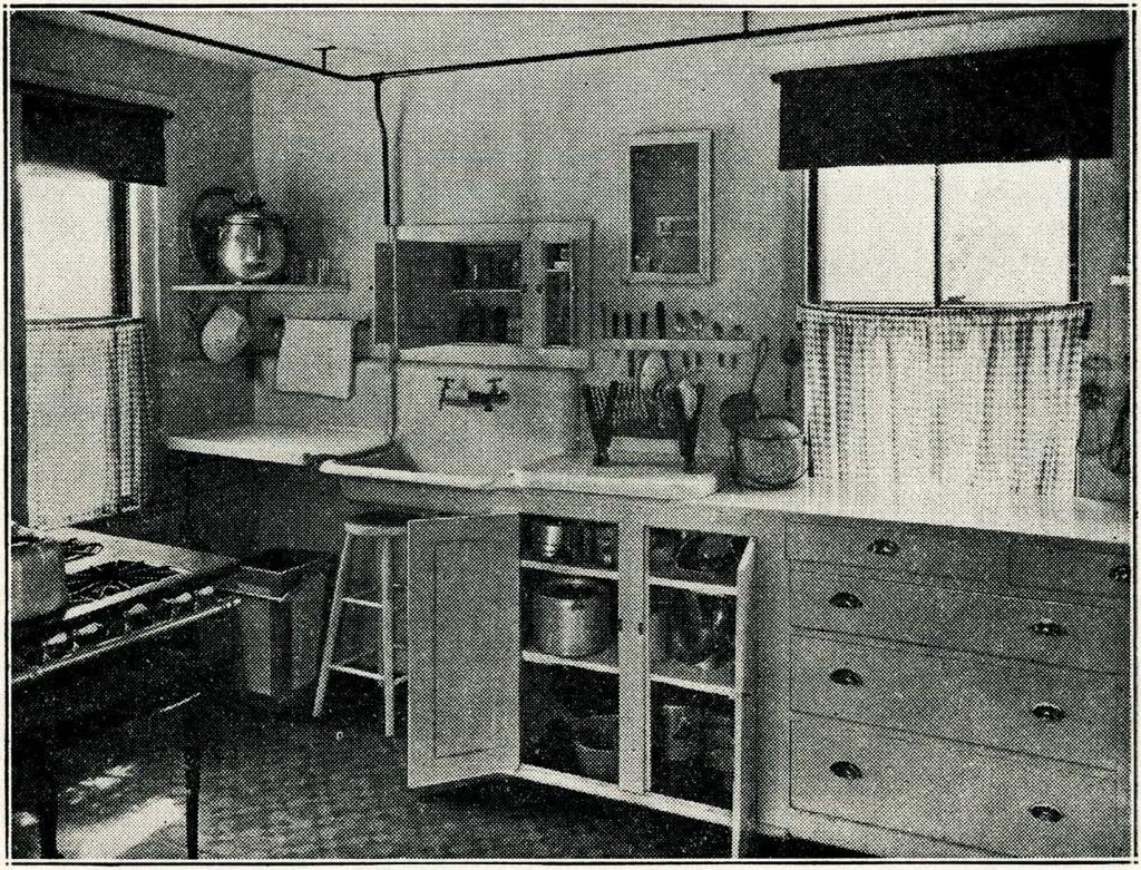 1.-A fine sink cabinet and cupboard for storing kettles. China carried by wheel tray. (Courtesy U. S. Dept.