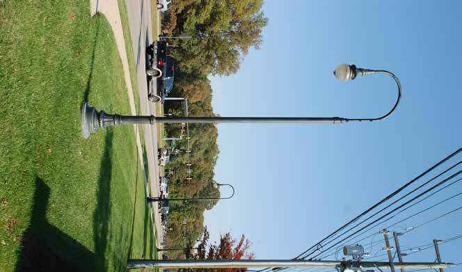 In keeping with the style of Midlothian Village, decorative goose neck street lights will be installed
