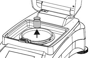 Follow the instructions on the display. Remove the sample pan. Place the required weight on the sample pan, close the cover.