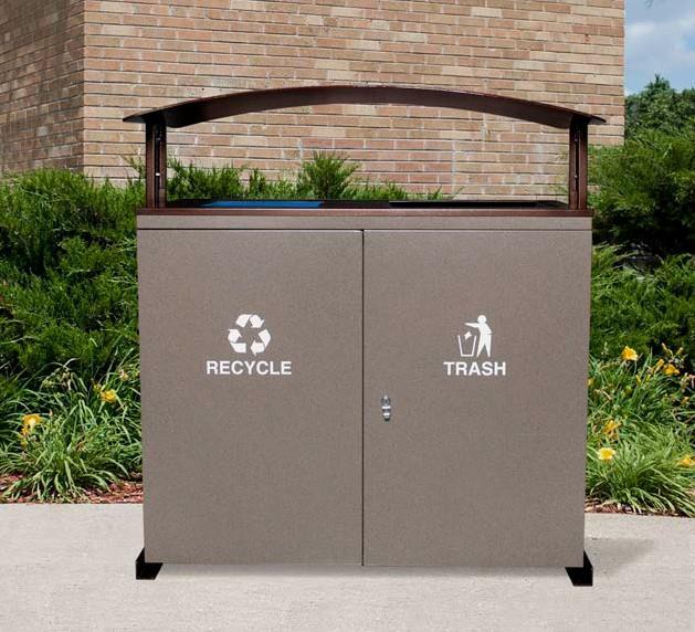 The unit is a heavy-duty two-stream waste and recycling receptacle designed for high volume/high traffic