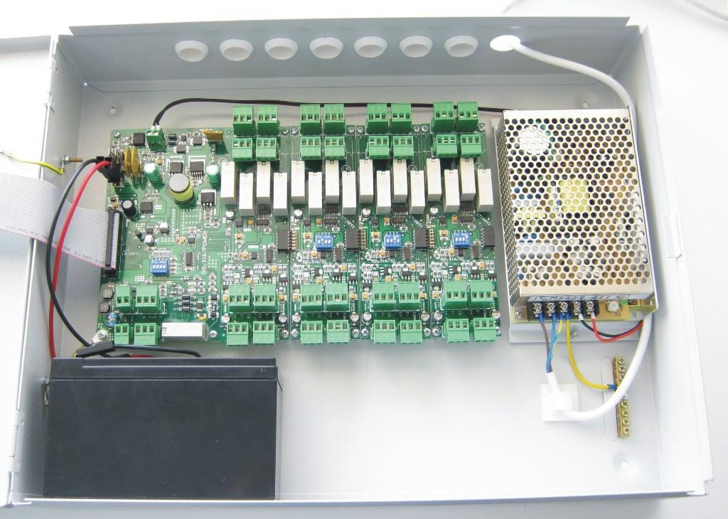 2.4 Description of the internal parts of the panel Mounting holes Relay terminals Inputs terminals Place batteries Connect power cable Ground terminals Mounting holes Figure 2: Inside the panel 2.