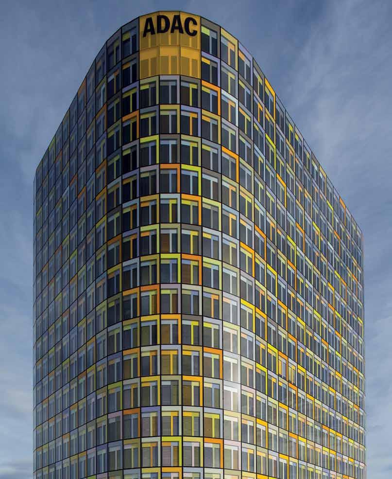 The outer facade, adorned with a mosaic of 22 colour tones, makes the new headquarters of Europe s largest automobile club instantly recognisable even from a distance.