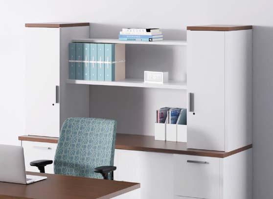seamlessly integrating with the worksurface or overhead storage.