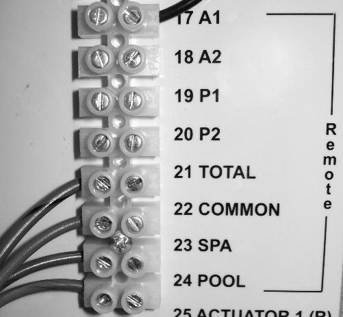 Installing a Remote Control Device on Analog Heaters Wiring For a 2-wire control, use the TOTAL and COMMON connections on the heat pump pool heater wiring block.