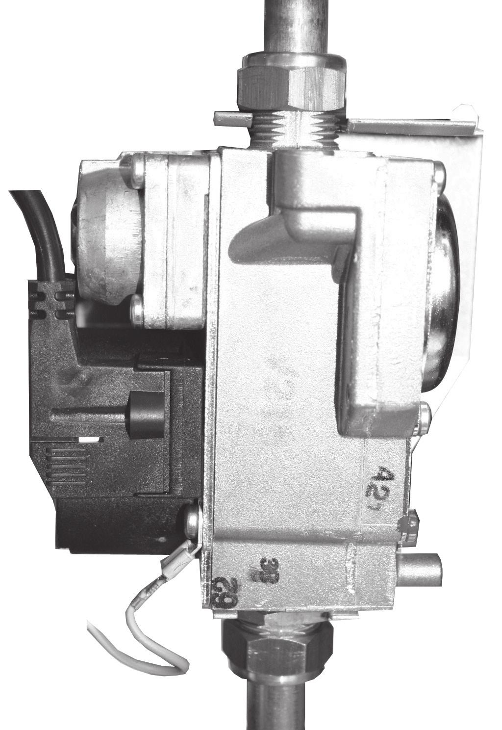 57 gas control valve replacement SERVICING 1. Refer to Frame 49. 2. Unplug the electrical plug connection from the gas control valve and disconnect the earth wire. 3.