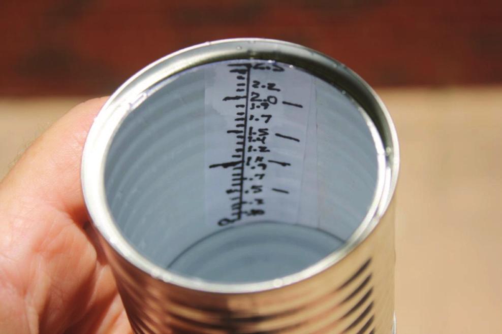 Start by finding nine irrigation catch cups that have measurement markings for levels of water.