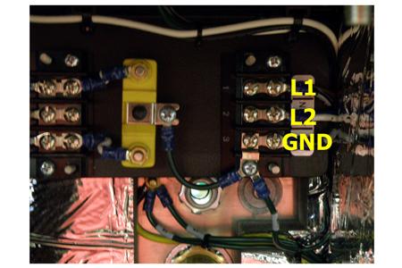 6.5.15 With a screwdriver, wire power to the terminal block of the dryer. 6.5.16 Reinstall the terminal block cover. 6.5.17 Tighten the strain relief. 6.5.18 Remove dust plug and connect the air supply line to the dryer Outlet Pressure port.